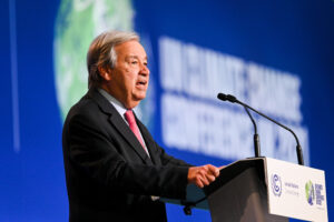 Antonio Guterres, Secretary-General of the United Nations, speaking at COP26 podium