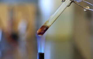 Test tube over bunsen burner flame